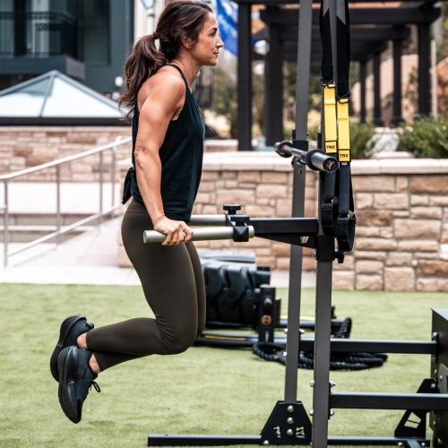A beautiful community at the heart of all your passions a woman working out in a yard